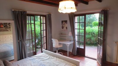 Bedroom with French doors to garden